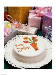 High angle view of a birthday cake with gifts 18.00 x 24.00 Poster Print