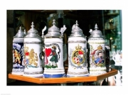 Group of beer steins on a table Poster